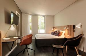 Letto o letti in una camera di Comwell Holte