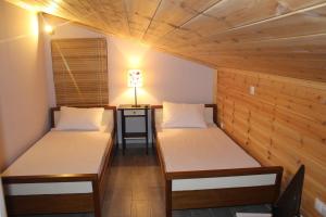 A bed or beds in a room at Villanta