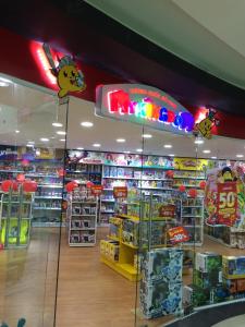 a store filled with lots of different types of toys at Hoang De Hotel in Da Lat