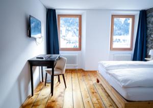 Bed&Bike Tremola San Gottardo客房内的一张或多张床位