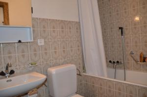 Koupelna v ubytování Immeuble La Maya + 21 fotografií