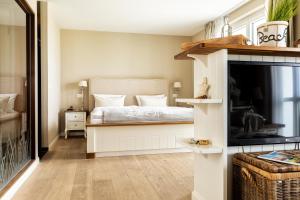 Postel nebo postele na pokoji v ubytování Hotel Zweite Heimat