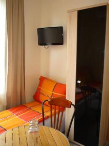 TV a/nebo společenská místnost v ubytování Mórafészek vendégház