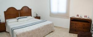 Postel nebo postele na pokoji v ubytování Hostal Batato