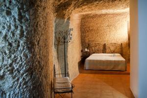Postel nebo postele na pokoji v ubytování Hostal Batato