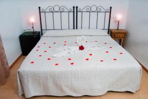 Postel nebo postele na pokoji v ubytování Hostal Batato