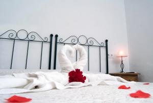 Postel nebo postele na pokoji v ubytování Hostal Batato