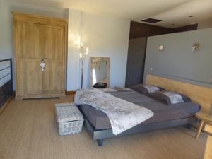 Postel nebo postele na pokoji v ubytování Gite Stone & Spa