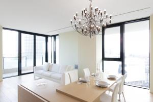 A bed or beds in a room at Stylish elegant Suite in Torre Solaria with exclusive Milan's view