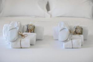 A bed or beds in a room at Stylish elegant Suite in Torre Solaria with exclusive Milan's view