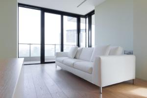 A seating area at Stylish elegant Suite in Torre Solaria with exclusive Milan's view