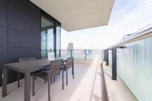 A balcony or terrace at Stylish elegant Suite in Torre Solaria with exclusive Milan's view