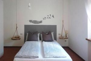 Łóżko lub łóżka w pokoju w obiekcie CASA MELL