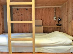 Postel nebo postele na pokoji v ubytování Hostel Bedgasm