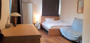 Hotel Kronberg tesisinde bir odada yatak veya yataklar