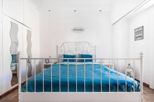 A bed or beds in a room at Acropolis Exceptional View