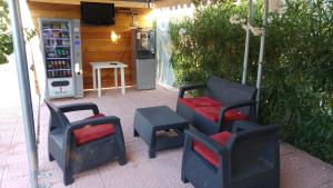 A seating area at Villini Giovanna Disanti