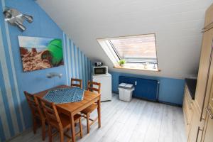 Kuchyň nebo kuchyňský kout v ubytování Ferienwohnung Esenshamm + 16 fotografií