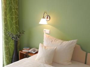 Cama o camas de una habitación en Garni Hotel Moselschild