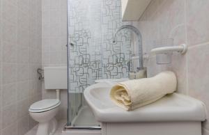 Kúpeľňa v ubytovaní Apartmani Adria LiLa Crikvenica Dramalj + 28 fotografií