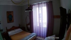 Łóżko lub łóżka w pokoju w obiekcie Hostal Hispalense