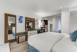 Postel nebo postele na pokoji v ubytování EST Hotel