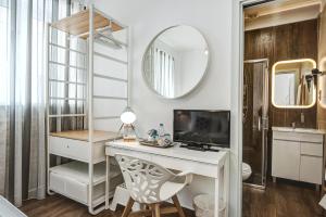 TV a/nebo společenská místnost v ubytování Loulé Coreto Guesthouse