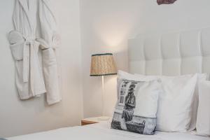 Postel nebo postele na pokoji v ubytování Loulé Coreto Guesthouse