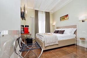 Letto o letti in una camera di Piazza Venezia Grand Suite