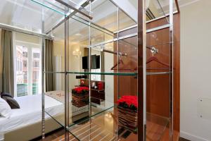 Letto o letti in una camera di Piazza Venezia Grand Suite