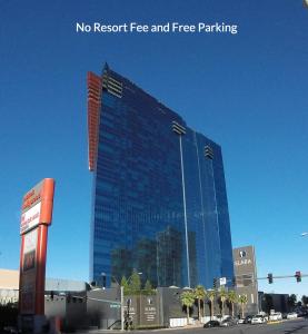 a tall blue building with a lot of windows at Suites at Elara Las Vegas Center Strip-No Resort Fees in Las Vegas