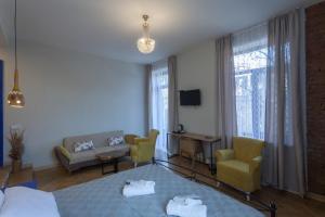 Posezení v ubytování Bricks Room Hotel