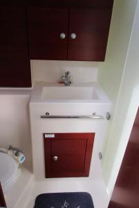 a bathroom with a sink and a toilet at La mia casa era sul porto in Trani