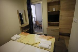 Postel nebo postele na pokoji v ubytování Villa Slavka