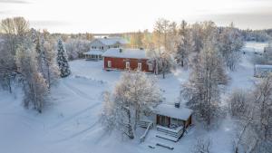 an aerial view of a house in the snow at Villa Seppälä in Ranua