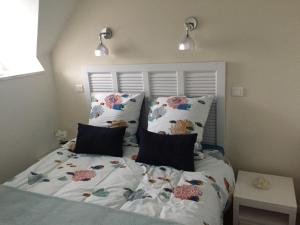 Postel nebo postele na pokoji v ubytování Appartements Duplex de Charme à Bénodet Vue Mer
