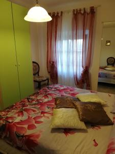 A bed or beds in a room at Casa Al Castello