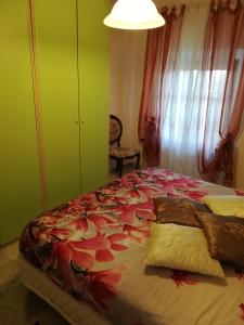 A bed or beds in a room at Casa Al Castello