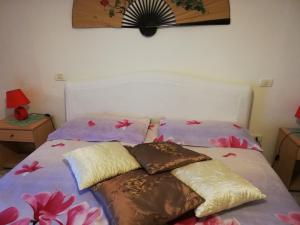 A bed or beds in a room at Casa Al Castello