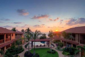 an aerial view of a resort at sunset at Las Villas, Villa Alegria,Troncones in Troncones