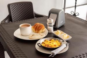 Opciones de desayuno disponibles en Hotel Elegant Suite