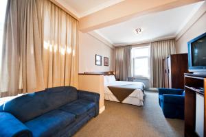 Hotel Thuringerhof tesisinde bir odada yatak veya yataklar