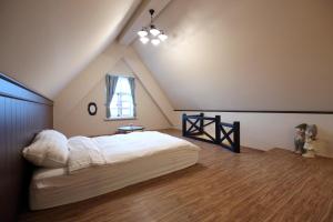 Ένα ή περισσότερα κρεβάτια σε δωμάτιο στο Serrado