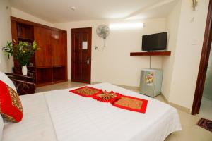 TV a/nebo společenská místnost v ubytování Nguyen Ha Hotel
