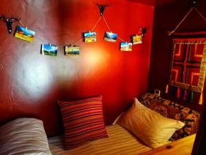 เตียงในห้องที่ Kangding Guozhuang Nan Wu Hao Boutique Inn