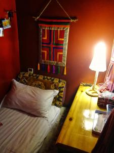 เตียงในห้องที่ Kangding Guozhuang Nan Wu Hao Boutique Inn