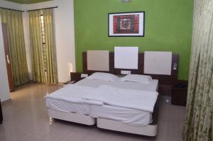Krevet ili kreveti u jedinici u objektu MPT Tourist Motel, Biaora