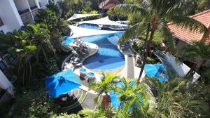 an overhead view of a pool at a resort at Prime Plaza Suites Sanur – Bali in Sanur