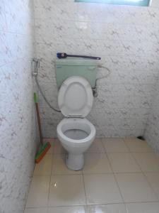 Koupelna v ubytování Vamoose Latpanchor Homestay