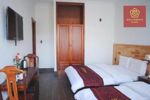 Voodi või voodid majutusasutuse Bảo Thịnh 2 Hotel toas